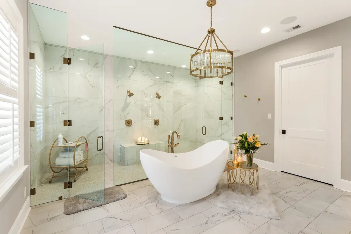 Bathroom design featuring a very large shower and a beautiful tub.