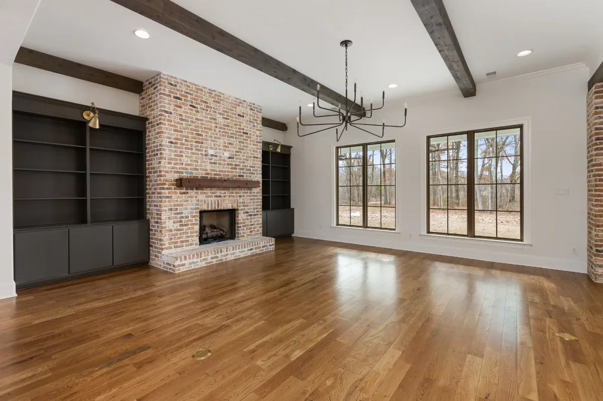 Beautiful hime interior with large wood beam supports.