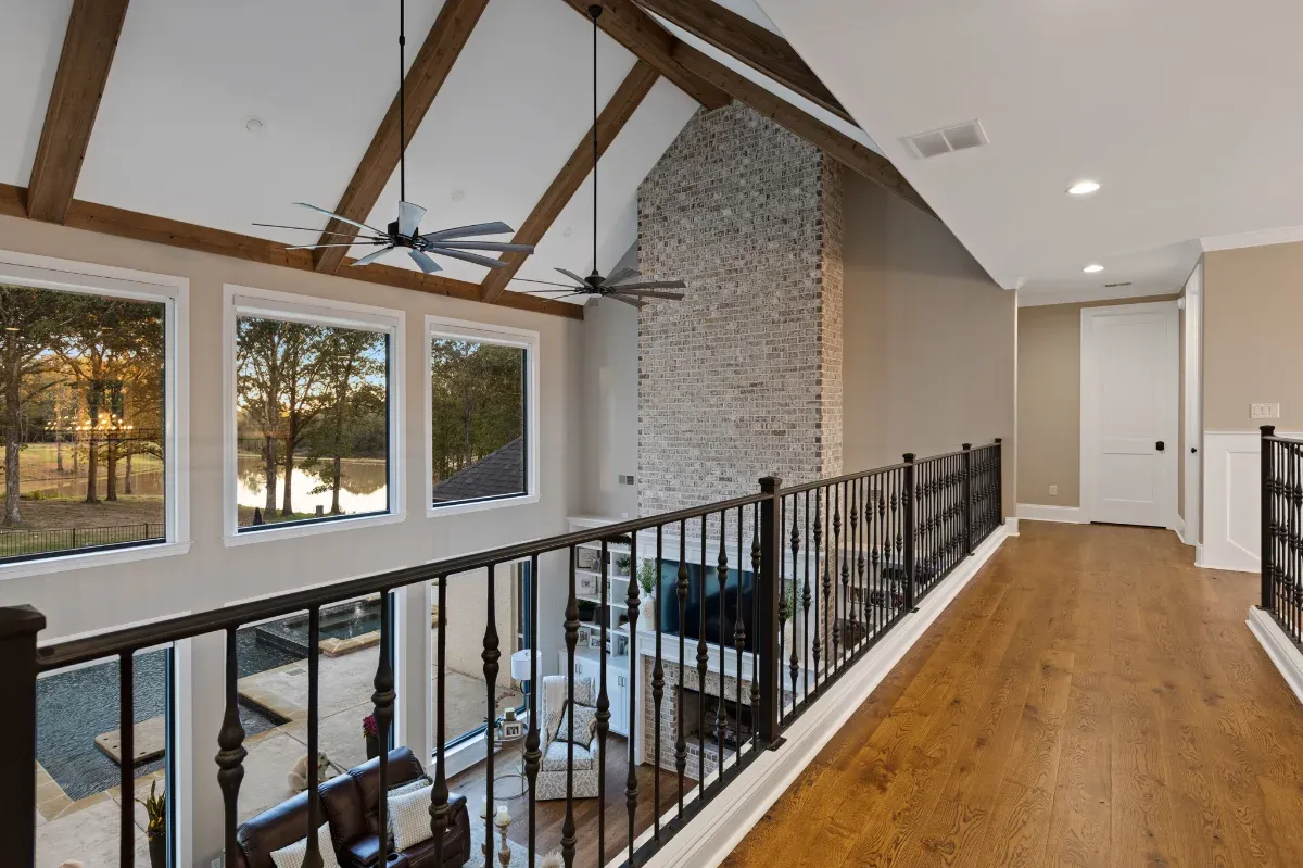 Gorgeous view overlooking a lloft with iron railing.
