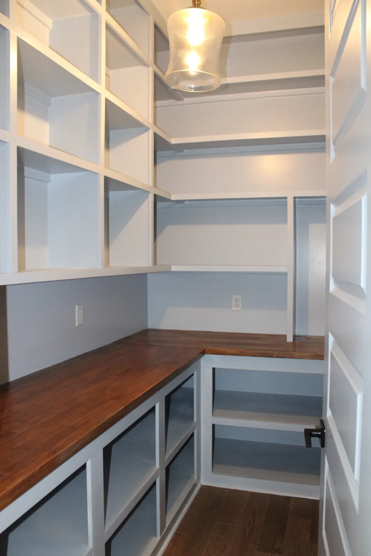 Closet with large storage shelves.
