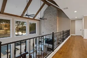 Custom home balcony with iron railing in DeSoto County MS.